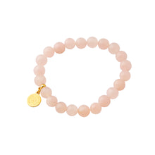 Load image into Gallery viewer, Elegant and stylish elastic Rose Quartz bracelet with details in 18k gold-plated 925 Sterling silver and brass. Rose quartz is called the love stone because it emits strong vibrations of love and happiness.

