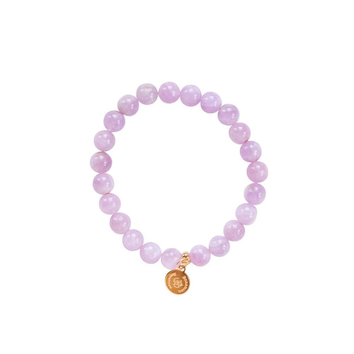 Elegant and stylish elastic Kunzite bracelet with gemstones and details in 18k gold-plated 925 sterling silver and brass. 