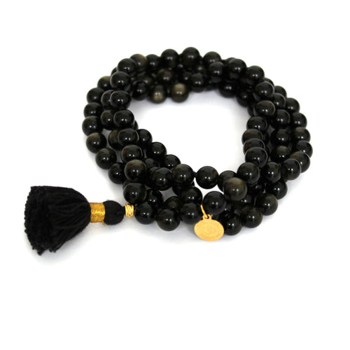 Elegant and exclusive Goldsheen obsidian Mala Necklace with 108 pearls, a tassel and details in 18k gold-plated sterling silver and brass. 
