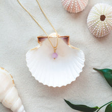 Load image into Gallery viewer, Stylish and minimalistic 42 cm long Kunzite necklace. Presented in a shell on a beach.
